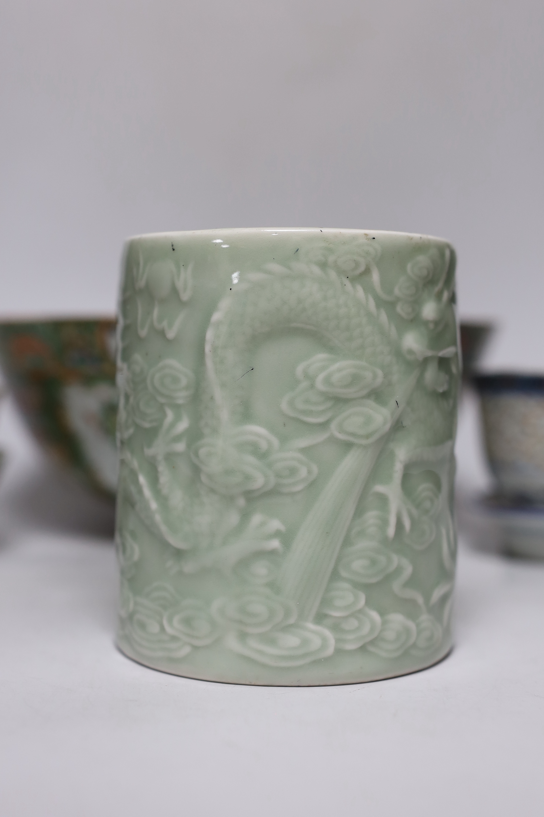 A Chinese celadon brush pot, a Cantonese bowl, two rice bowls and a rice bowl on stand, Cantonese bowl 26cm diameter